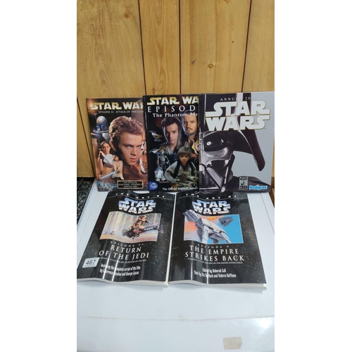 467 - Collection of Star Wars books, including Episode II, The Phantom Menace, and a 2008 annual, along wi... 