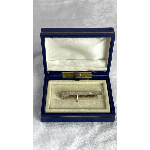 108 - Sterling silver tie clip, engraved design, Birmingham assay, 1978. Maker's mark: JH for John Henry, ... 