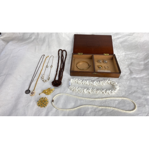 113 - Mixed jewellery lot including cufflinks, gold-tone blue gemstone ring,,” and various necklaces with ... 