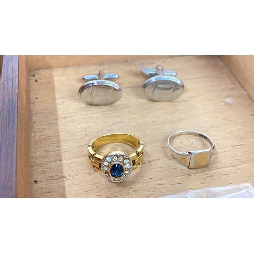 113 - Mixed jewellery lot including cufflinks, gold-tone blue gemstone ring,,” and various necklaces with ... 