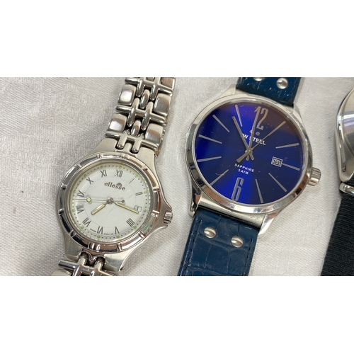 122 - Set of four wristwatches featuring diverse designs and brands including Ellesse, Sekonda, and Mvmt, ... 