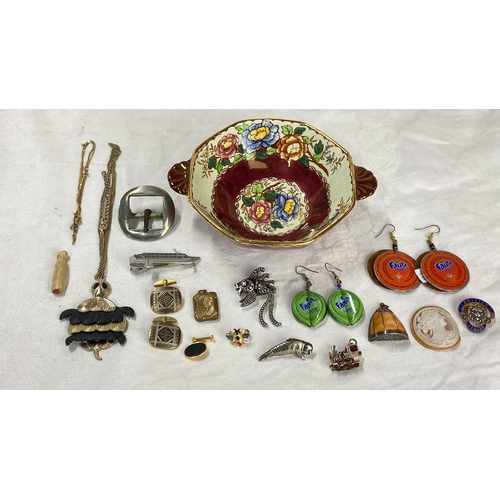 128 - Mixed lot featuring vintage jewelry, colorful porcelain bowl, novelty accessories including Fanta ea... 