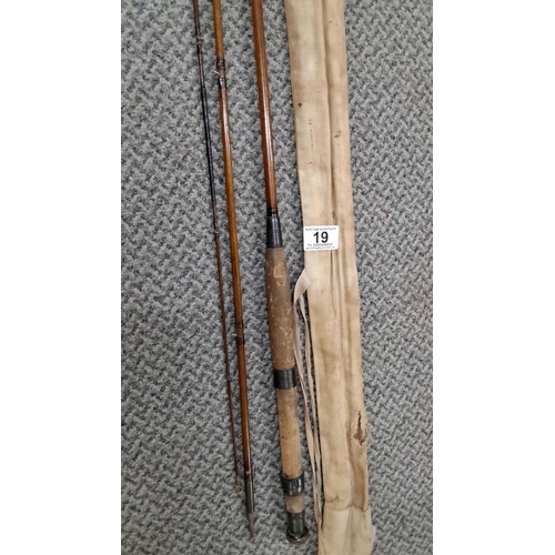 19 - Three-piece Alcot three piece fly rod with cork handle.