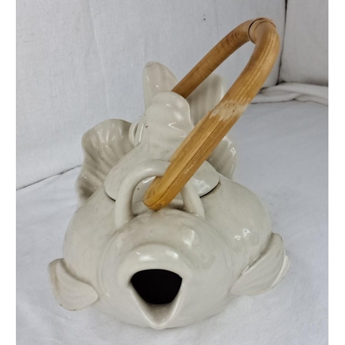 28 - Ceramic koi fish teapot with bamboo handle. Distinctive fish design, unglazed earthenware finish.