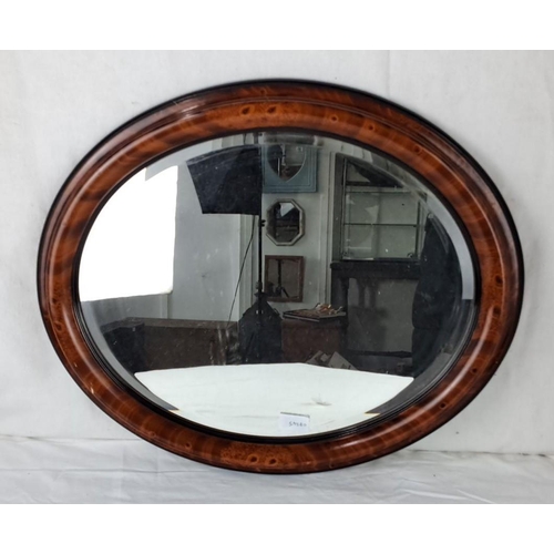 3 - Oval Victorian mirror with burled walnut veneer frame.