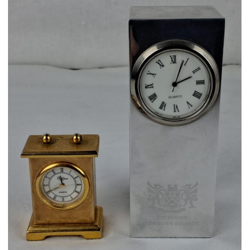 33 - Two quartz miniature clocks: one Coleraine Borough Council silver-tone tall block and one gold-tone ... 