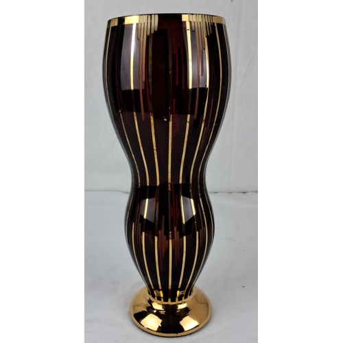 39 - Art Deco-inspired glass vase with elegant gold striping on deep brown finish. It has a flared body a... 