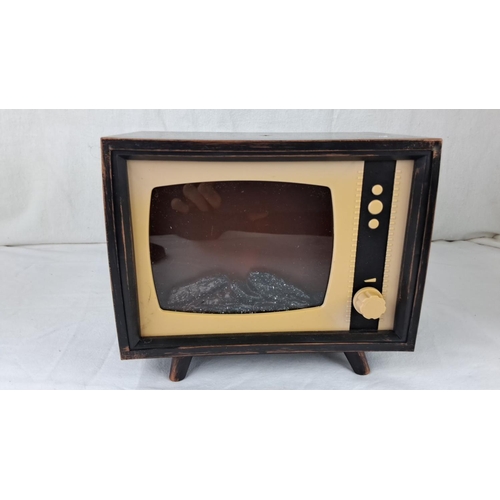 48 - Vintage style TV-shaped novelty nightlight with faux wood casing. Features glowing embers effect.