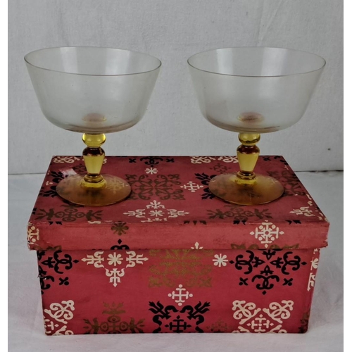 50 - Pair of vintage frosted glass goblets with amber stems, accompanied by a decorative patterned box.