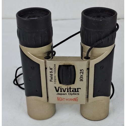 52 - Vivitar 10x25 binoculars with Japan optics have a 5.8° field view and 102m at 1000m.