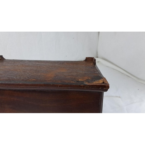 58 - Victorian mahogany tea caddy with brass handle and escutcheon (one foot a/f).