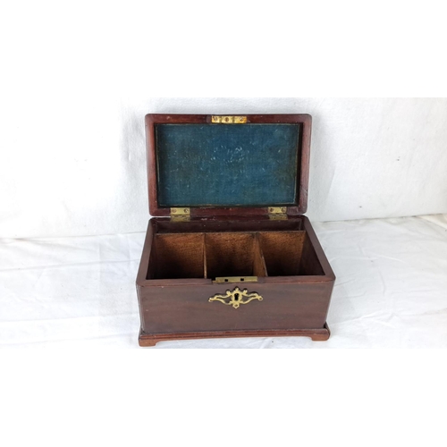 58 - Victorian mahogany tea caddy with brass handle and escutcheon (one foot a/f).