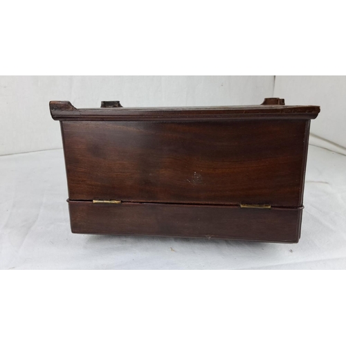 58 - Victorian mahogany tea caddy with brass handle and escutcheon (one foot a/f).