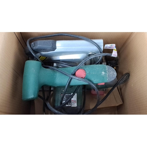 63 - Parkside Circular Saw PHKS 1350 A1, 1350W, includes accessories and blades. Boxed model 108024.