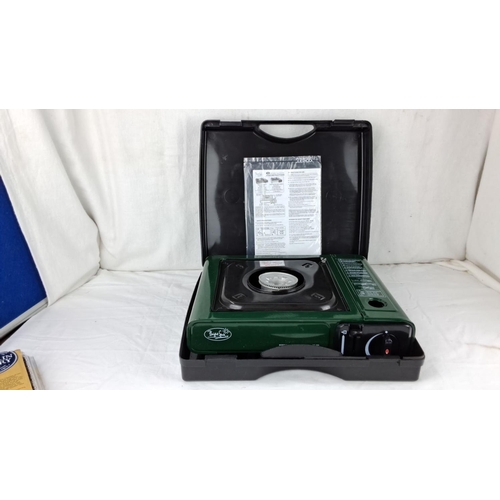 66 - Portable single-burner gas stove in carrying case. Brand: Bright Spark. Includes user instructions.