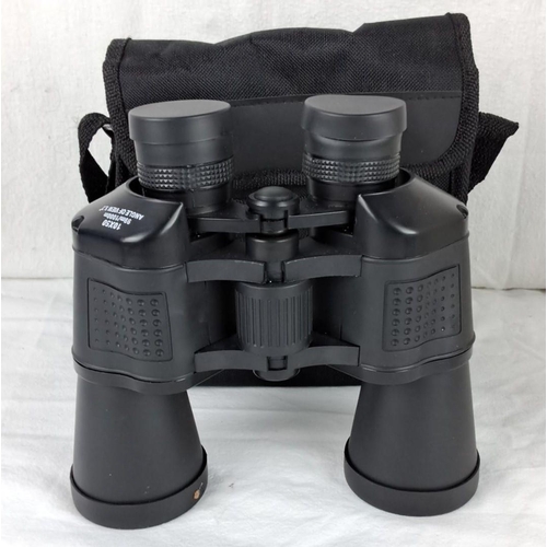 70 - 10x50 binoculars with optics caps and carrying case.