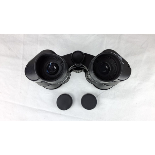 70 - 10x50 binoculars with optics caps and carrying case.