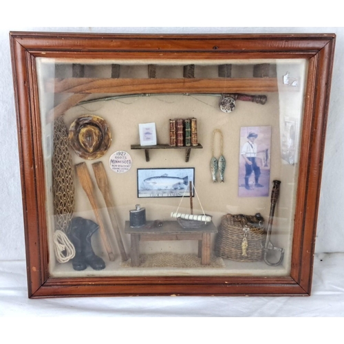 73 - Shadow box features vintage fishing memorabilia, including oars, a net, and a 1927 Minnesota fishing... 