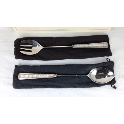 74 - Pottery Barn serving set with mother of pearl handles, stainless steel. Includes fork and spoon in o... 