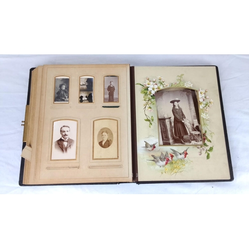 76 - An early antique photo album with embossed floral leather cover, containing vintage portraits and co... 