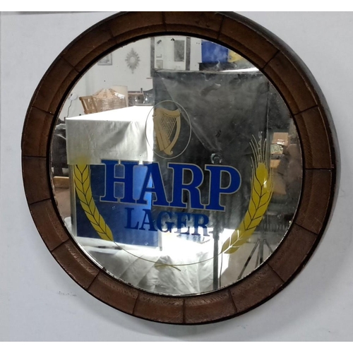 77 - Vintage Harp Lager advertising mirror with barrel effect frame, measures 14.5