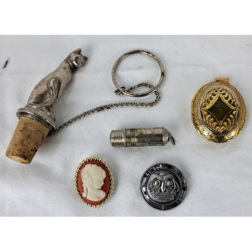 86 - Eclectic lot comprising a silver cat bottle stopper, engraved compact, cameo brooch, abalone inlay b... 