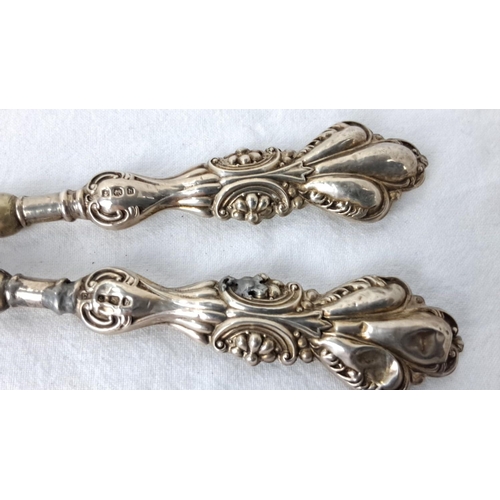 89 - Sterling silver handled glove stretchers with elaborate Baroque-style handles, bearing hallmarks ind... 