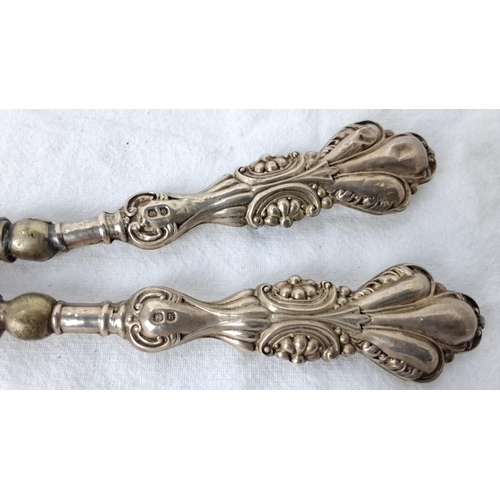 89 - Sterling silver handled glove stretchers with elaborate Baroque-style handles, bearing hallmarks ind... 