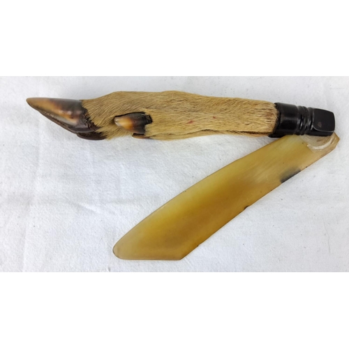 94 - Antique deer hoof folding page turner with horn blade.