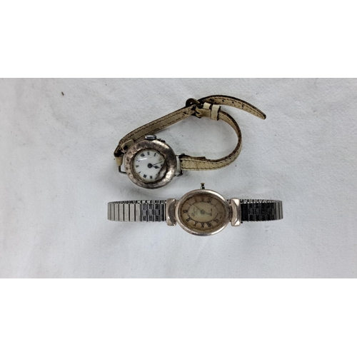 95 - 2 antique/ vintage wristwatches, to include 1 in sterling silver case.