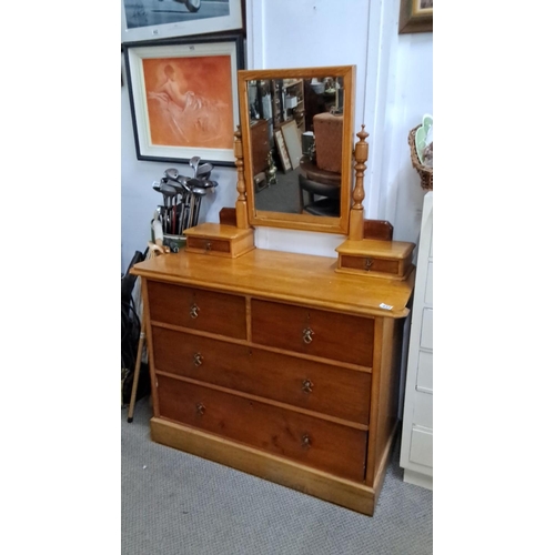 433 - Victorian oak dressing table with tilting mirror, four drawers, and turned supports. Classic design.