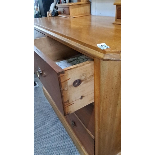 433 - Victorian oak dressing table with tilting mirror, four drawers, and turned supports. Classic design.