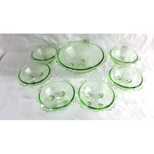 434 - Set of seven green glass bowls with decorative bubble accents, includes one large serving bowl and s... 