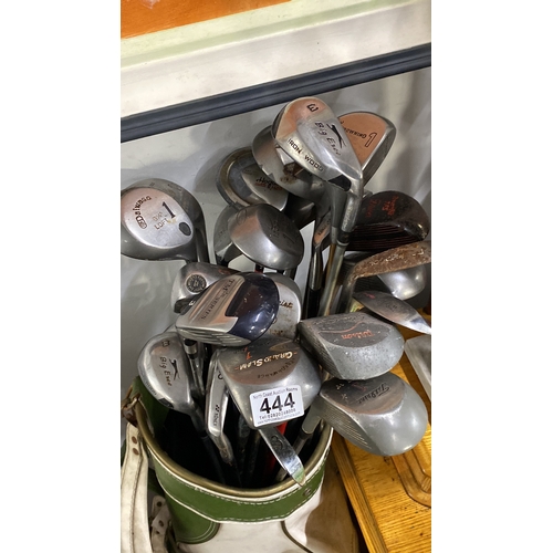 444 - Golf club set includes mixed brands such as Yonex and Big Ezee. The set comes in a vintage green and... 