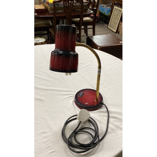 460 - Vintage red desk lamp with brass flexible arm. Mid-century modern style, features a classic design w... 