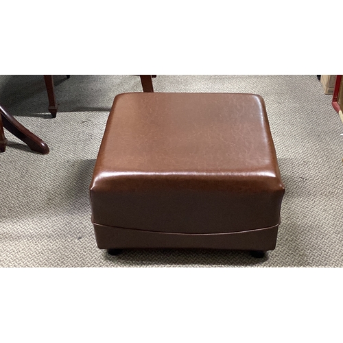 466 - Upholstered brown leather ottoman with squared design.