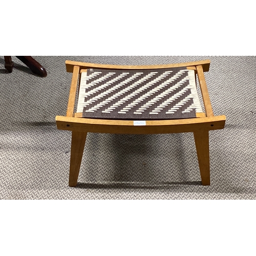 467 - Mid-Century Modern stool with woven geometric seat and light wood frame, showcasing clean lines and ... 