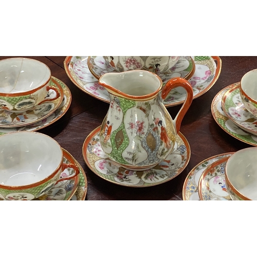 468 - Vintage Japanese Kutani porcelain teacup set featuring intricate Geisha and floral motifs with vibra... 