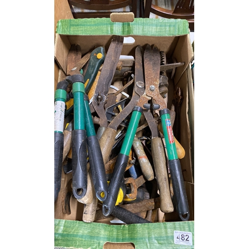 482 - Mixed lot of assorted garden and hand tools, featuring green-handled shears, various rusted wrenches... 