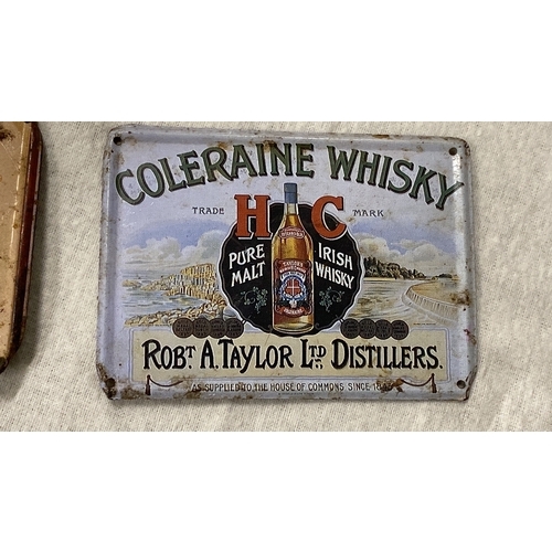 449 - Vintage Irish whiskey advertising tins, featuring Bushmills and Coleraine brands. Feature colorful g... 