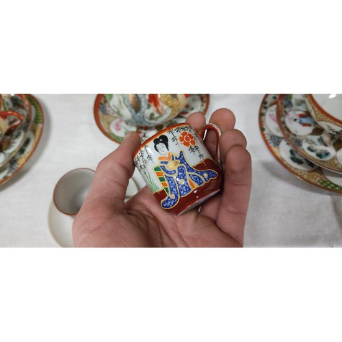 468 - Vintage Japanese Kutani porcelain teacup set featuring intricate Geisha and floral motifs with vibra... 