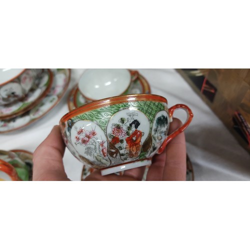 468 - Vintage Japanese Kutani porcelain teacup set featuring intricate Geisha and floral motifs with vibra... 