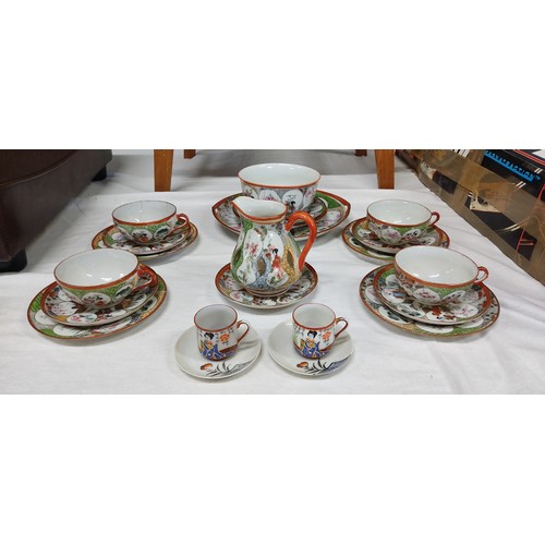 468 - Vintage Japanese Kutani porcelain teacup set featuring intricate Geisha and floral motifs with vibra... 