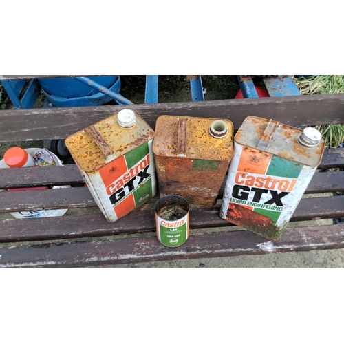 24 - Collection of vintage Castrol GTX motor oil and grease cans includes three large tins and one smalle... 