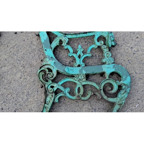 25 - Antique cast iron bench ends with ornate scrolling design, featuring lion head detail. Victorian era... 