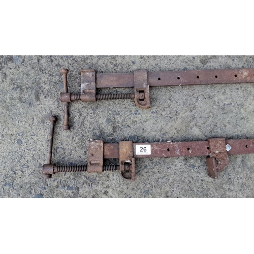 26 - Pair of vintage iron sash clamps with adjustable screw mechanism. Rugged, heavy-duty construction.