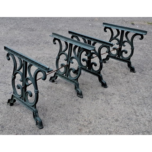 38 - Two decorative cast iron table bases.