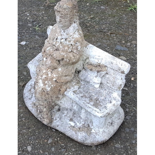 6 - Stone garden sculpture depicts a figure seated on a bench. Natural weathering adds character and tex... 