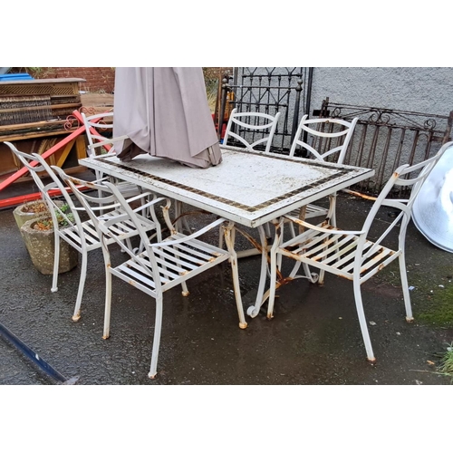 53 - Outdoor metal patio set with six chairs and rectangular table, featuring intricate lattice design.