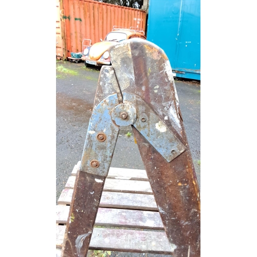 56 - Wooden vintage step ladder with metal hinges, featuring four steps.